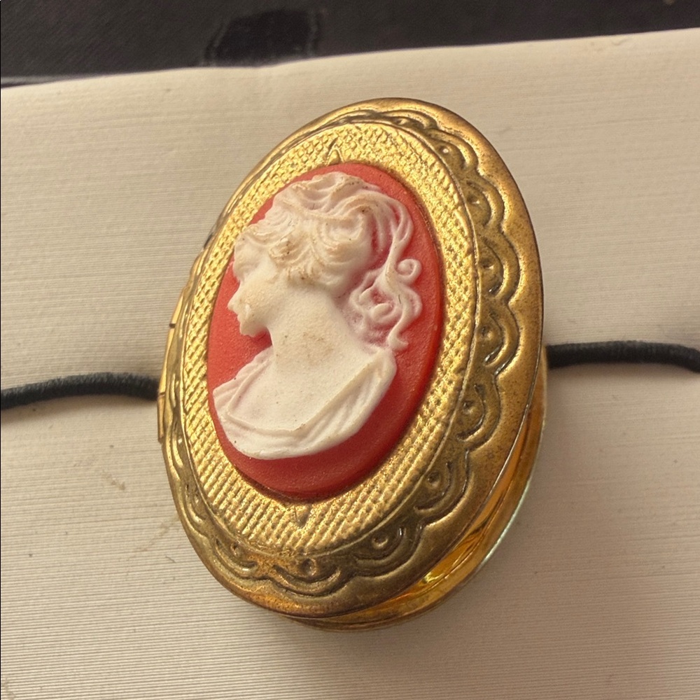 Elegant Gold and Red Cameo Locket